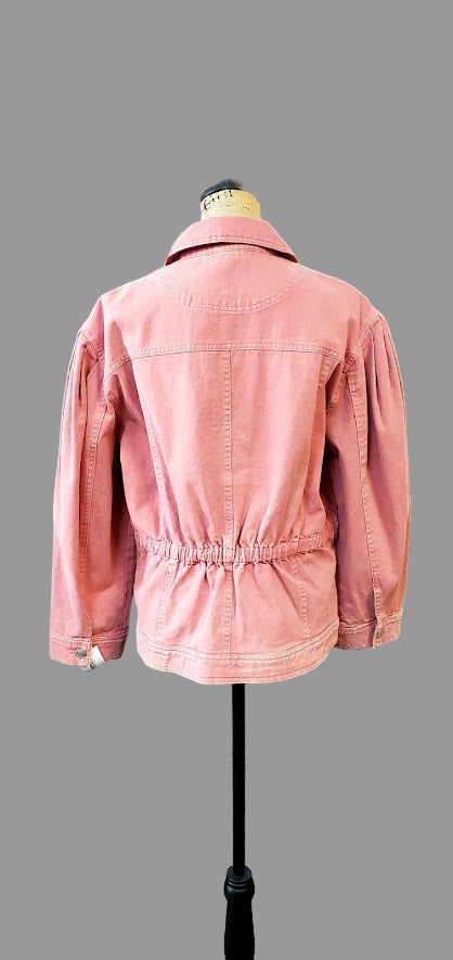 Pink jacket on a mannequin in a clothing store setting